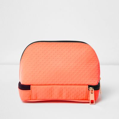 Orange make-up bag with zip bottom